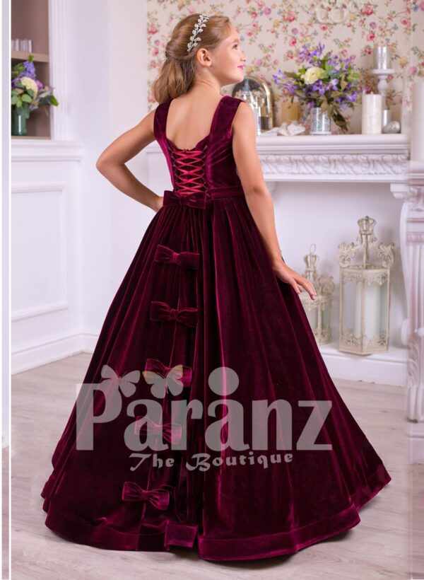 Pigmented burgundy floor length velvet dress with big flower prints back side view