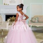 Pink glitz sleeveless bodice baby gown with flared and high volume tulle skirt side view