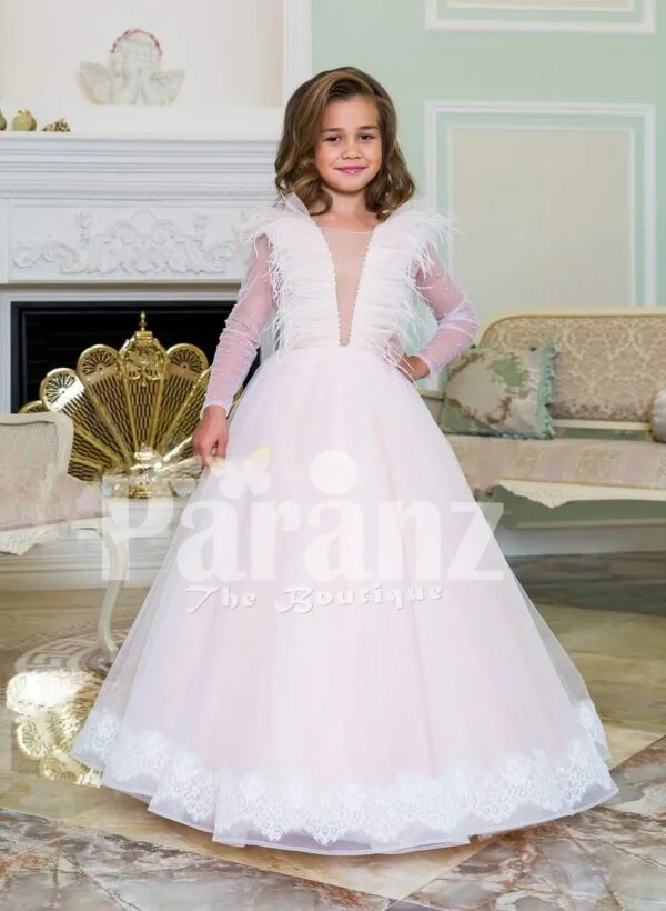 Powder pink floor length baby gown dress with full sheer sleeves and ruffle-feather bodice