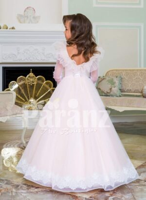 Powder pink floor length baby gown dress with full sheer sleeves and ruffle-feather bodice Back side view