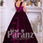 Rich satin floor length baby party gown with tulle skirt underneath and rhinestone waist belt side view
