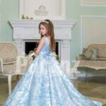 Rich satin shiny floor length baby gown with all over same hue floral appliqués in blue side view