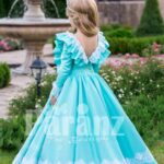 Rich satin sky blue baby gown with full sleeve and floor length tulle skirt underneath back side view