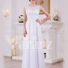 Sleeveless pearl white floor length tulle skirt wedding gown with lace appliquéd bodice