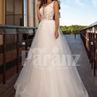 Sleeveless white lace work soft tulle wedding gown
