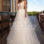 Sleeveless white lace work soft tulle wedding gown