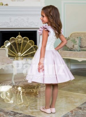 Tea length rich satin party dress for girls with white lace work bodice and frilly sleeves side view