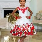 Tea length rich white satin party dress with red rosette print for girls