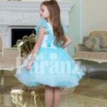 Tea-length sky blue soft and lightweight tulle skirt party dress for girls back side view