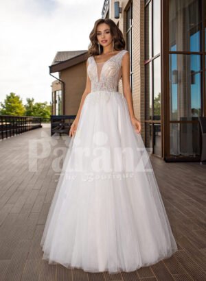 White floor length tulle wedding gown with glitz glam bodice