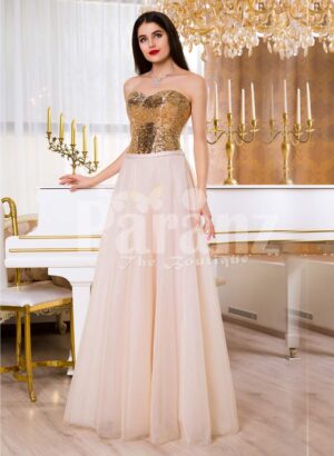 Women super stylish golden sequin bodice evening gown with long pink tulle skirt