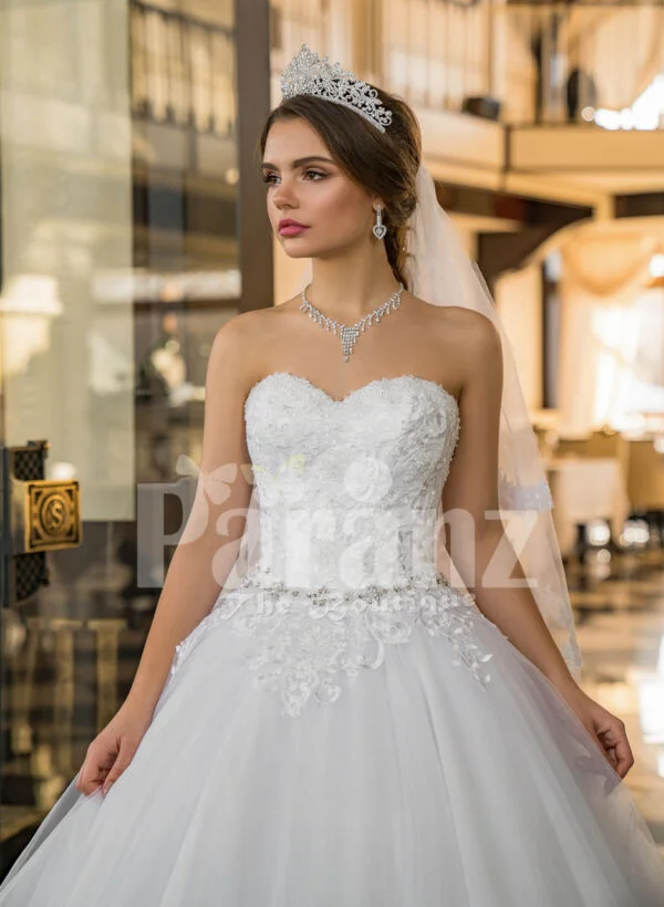 Womens beautiful off-shoulder pearl white tulle wedding gown with floral bodice