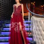 Womens deep maroon floor length evening gown with side slit tulle skirt and sleeveless bodice