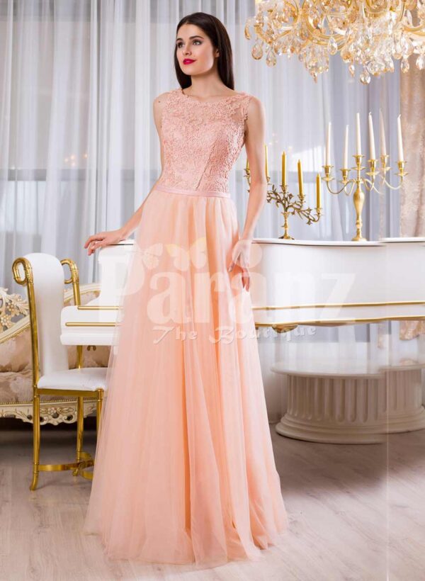 Womens floor length tulle skirt evening gown with appliquéd bodice in peach hue