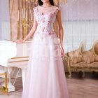 Womens light pink evening gown with long tulle skirt and pink flower appliquéd bodice