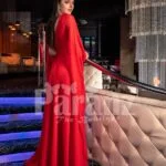 Womens vibrant red side slit tulle skirt gown with long frilly sleeves