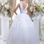 Women’s Barbie style pearl white sleeveless wedding gown with high volume tulle skirt back side view