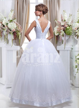 Women’s Barbie style pearl white sleeveless wedding gown with high volume tulle skirt back side view