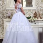 Women’s Cinderella style flared tulle skirt wedding gown with lace appliquéd royal bodice back side view