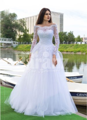 Women’s all white elegant wedding tulle skirt gown with royal bodice and full sleeves