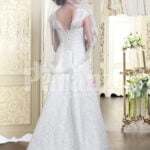 Women’s beautiful floor length wedding satin gown with major white lace work back side view