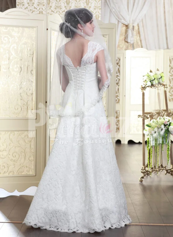 Women’s beautiful floor length wedding satin gown with major white lace work back side view