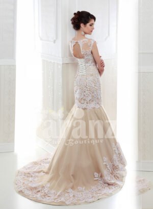 Women’s beautiful mermaid style tulle skirt wedding gown in beige back side view