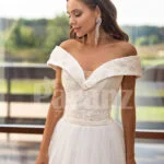 Women’s beautiful off-shoulder styled floor length tulle gown with glam bodice close view