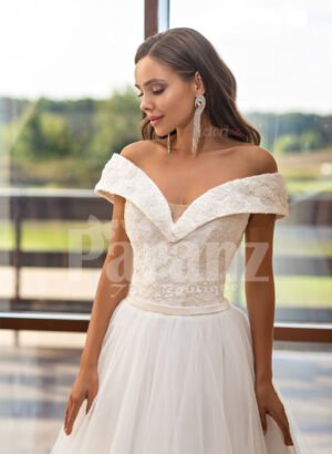 Women’s beautiful off-shoulder styled floor length tulle gown with glam bodice close view