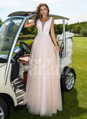 Women’s beautiful power pink-white wedding tulle gown with criss-cross lock back