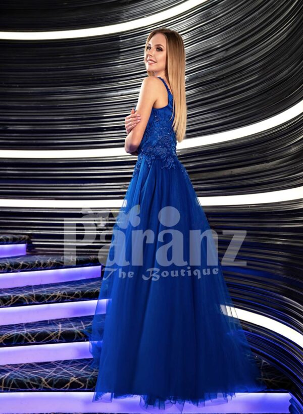 Women’s blue soft and lightweight side slit tulle skirt gown with rhinestone studded bodice back side view (2)