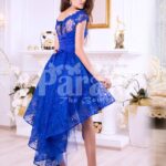 Women’s bright blue high-low satin party gown with all over rich lace work side view