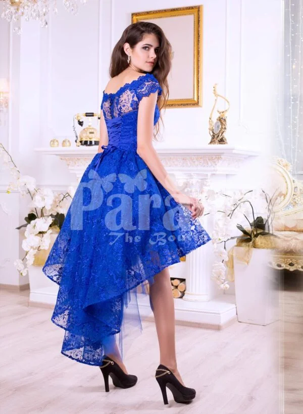 Women’s bright blue high-low satin party gown with all over rich lace work side view