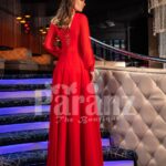 Women’s bright red side slit evening satin gown with full sleeve bodice back side view