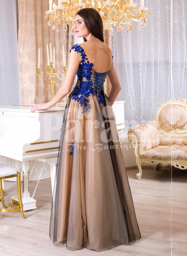 Women’s brown-grey floor length tulle skirt evening gown with bright floral appliquéd bodice back side view