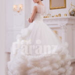 Women’s cloud ruffle hem high volume tulle skirt wedding gown in white side view