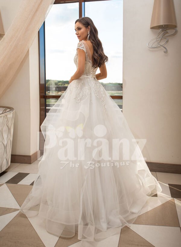 Women’s dreamy pearl white wedding tulle gown with royal bodice back side view