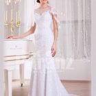 Women’s dreamy sleeveless mermaid styled rich satin-sheer wedding gown with tulle skirt