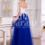 Women’s elegant contrast evening gown with royal blue tulle skirt and satin white bodice side view