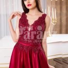 Women’s elegant maroon floor length evening gown with tulle skirt and royal bodice
