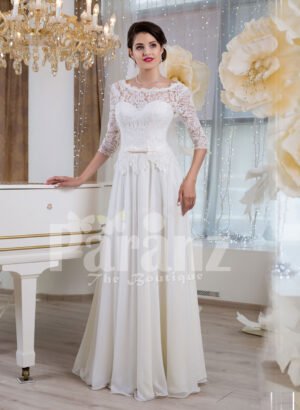 Women’s elegant white lacy bodice floor length tulle skirt wedding gown