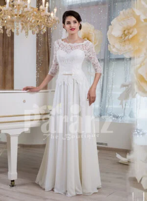 Women’s elegant white lacy bodice floor length tulle skirt wedding gown