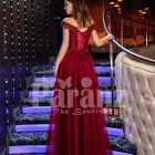 Women’s exciting maroon evening gown with side slit skirt and royal rhinestone bodice back side view