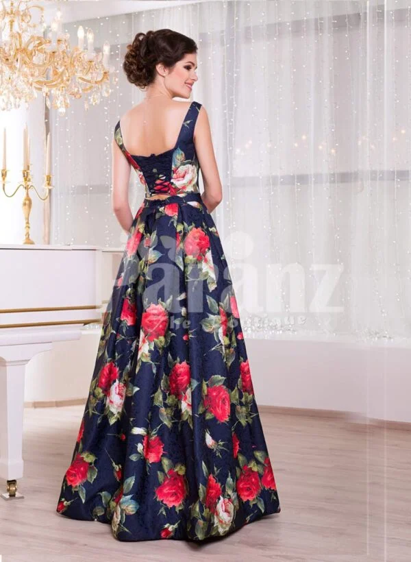 Women’s fancy rich satin floor length blue gown with colorful floral prints all over side view