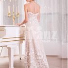 Women’s floor length sleek tulle evening gown with all over white floral lace appliqués back side view