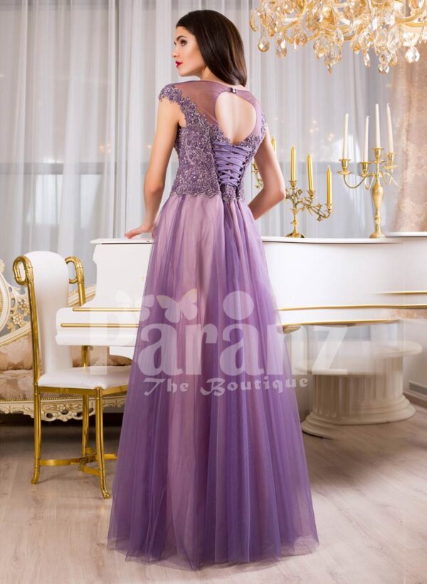 Women’s floor length tulle skirt evening gown with royal rhinestone studded bodice in mauve back side view