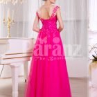 Women’s fuchsia elegant evening gown with long tulle skirt and lace appliquéd bodice back side view
