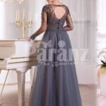 Women’s full sheer sleeve evening party gown with flared and long tulle skirt in grey back side view