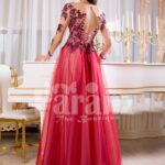 Women’s full sheer sleeve flared tulle skirt evening gown with floral appliquéd bodice back site view