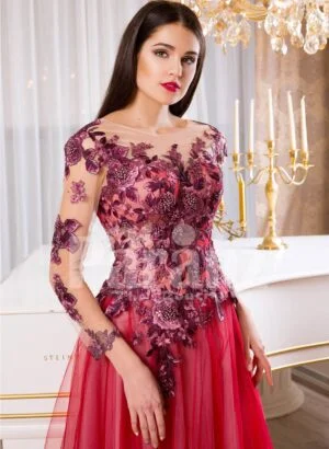 Women’s full sheer sleeve flared tulle skirt evening gown with floral appliquéd bodice close view